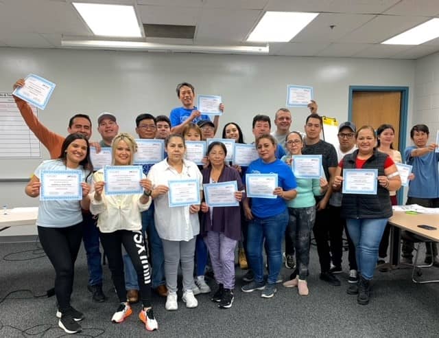 L'Oreal team participating in workplace language training