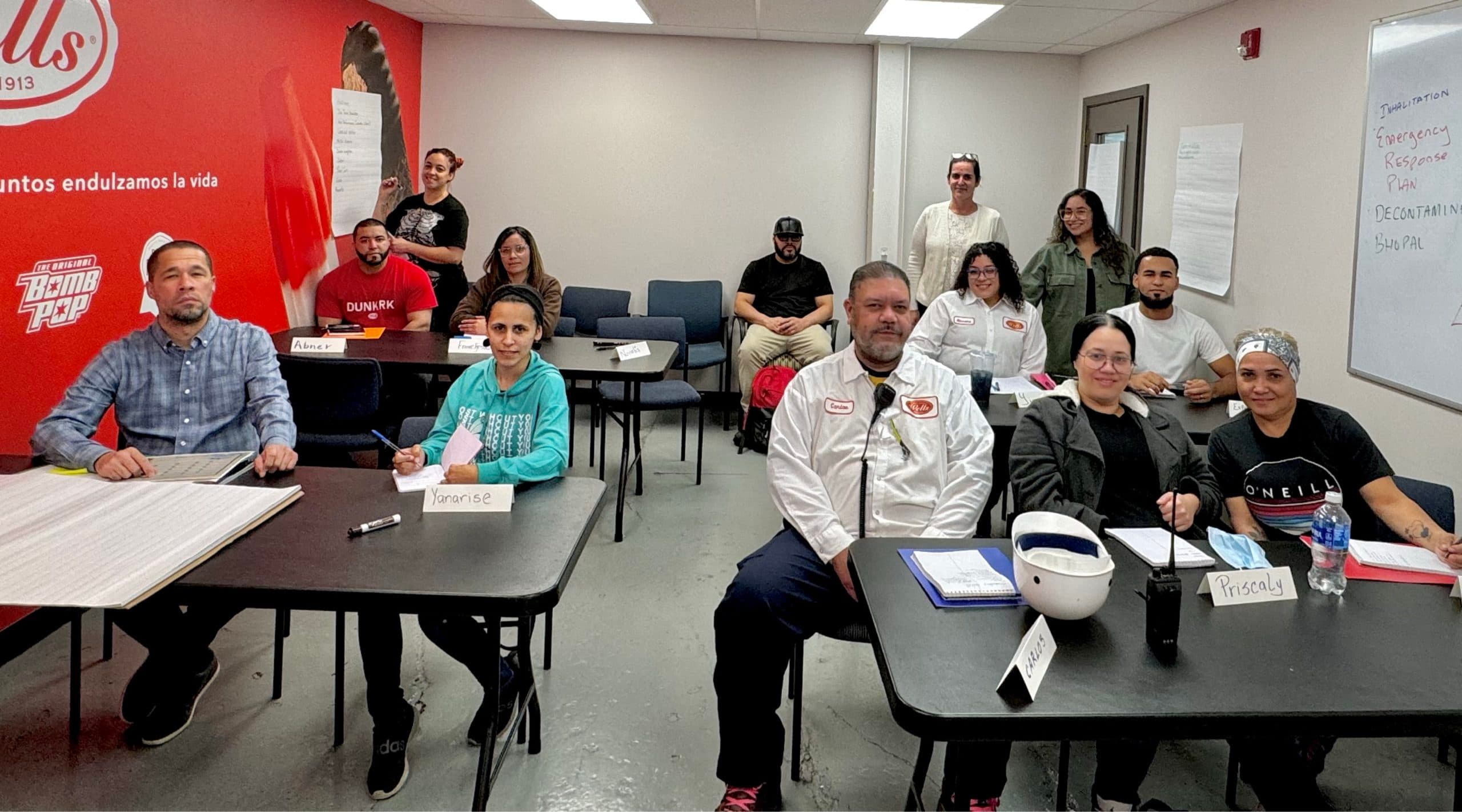 Employees participating in a real workplace language class onsite