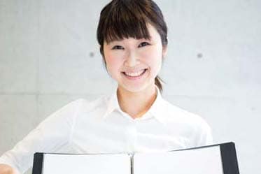 A woman smiling